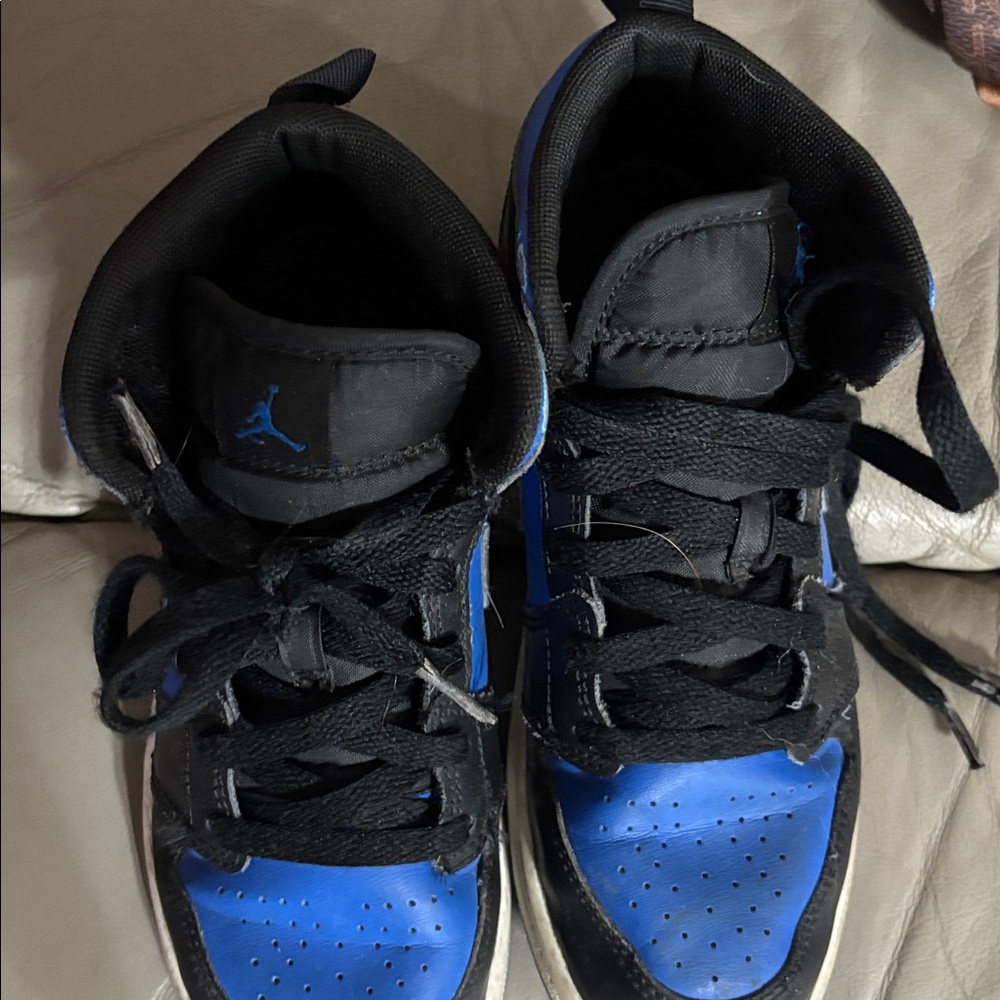 Boys Jordan Black and Blue Sneakers